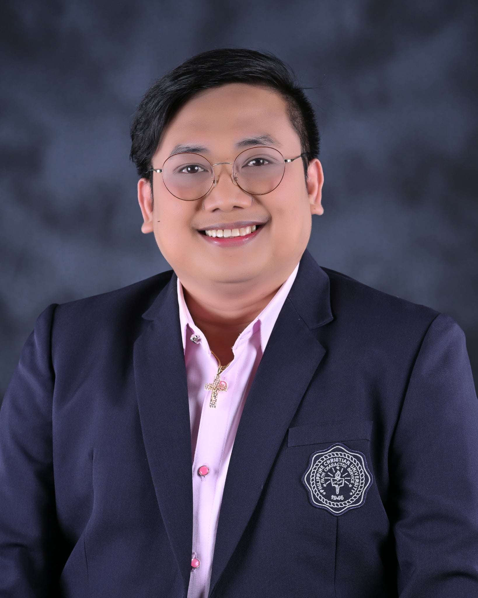 Junnell E. Guia, MBA, MEI, Ph.D.(c)
